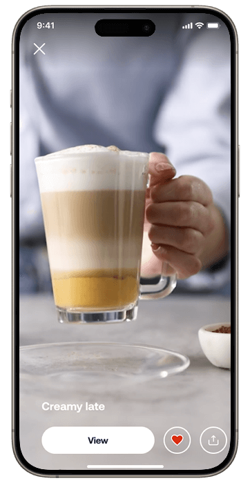 Smarttelefon med HomeID-skjerm med eksempel på kaffeoppskrift